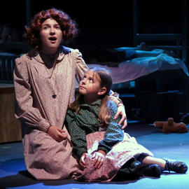 a woman and daughter in a play in vero beach