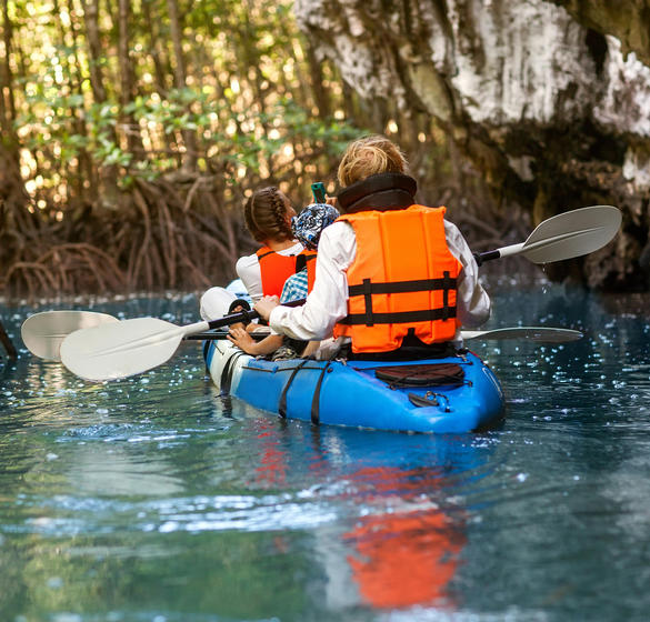 People kayaking in a lagoon