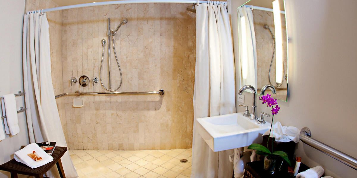 Accessible bathroom with roll in shower